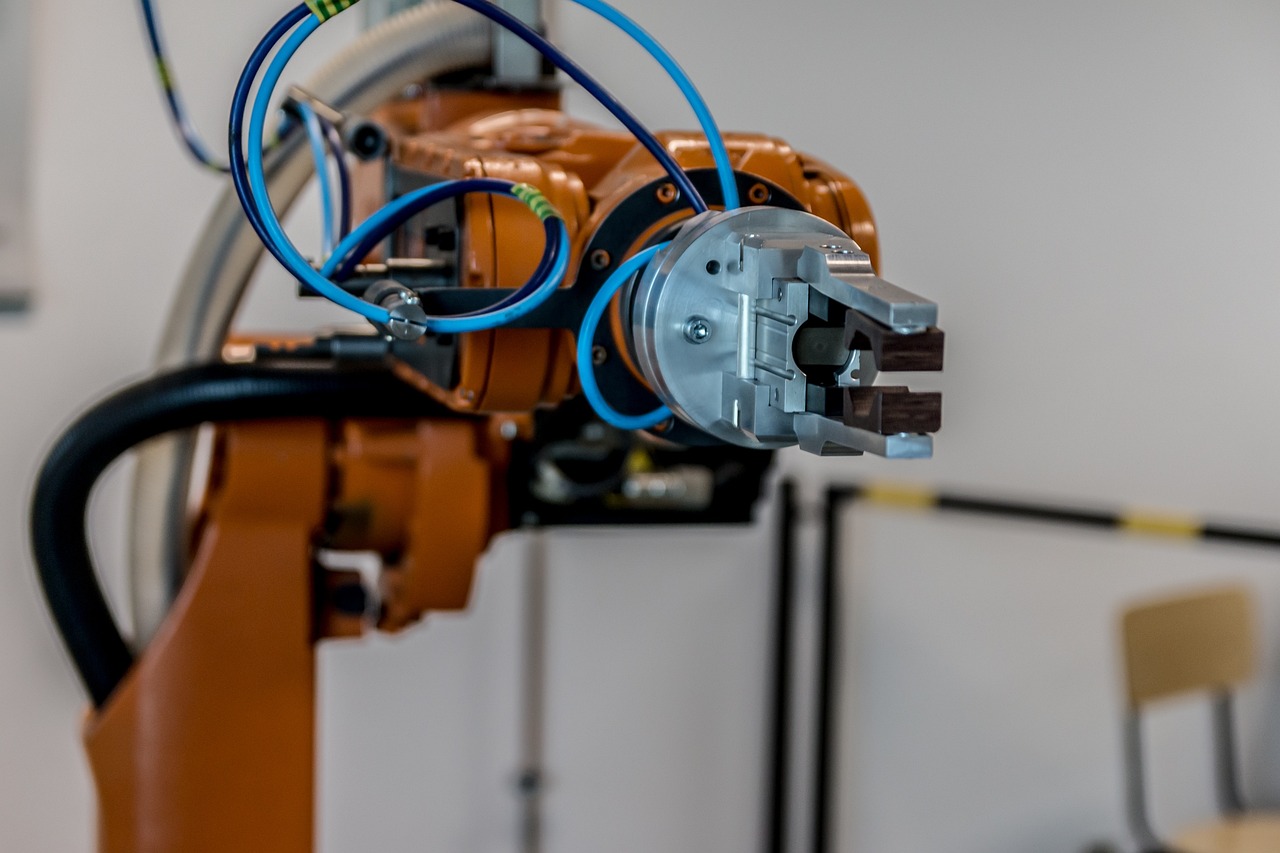 An industrial robotic arm on an automated production line