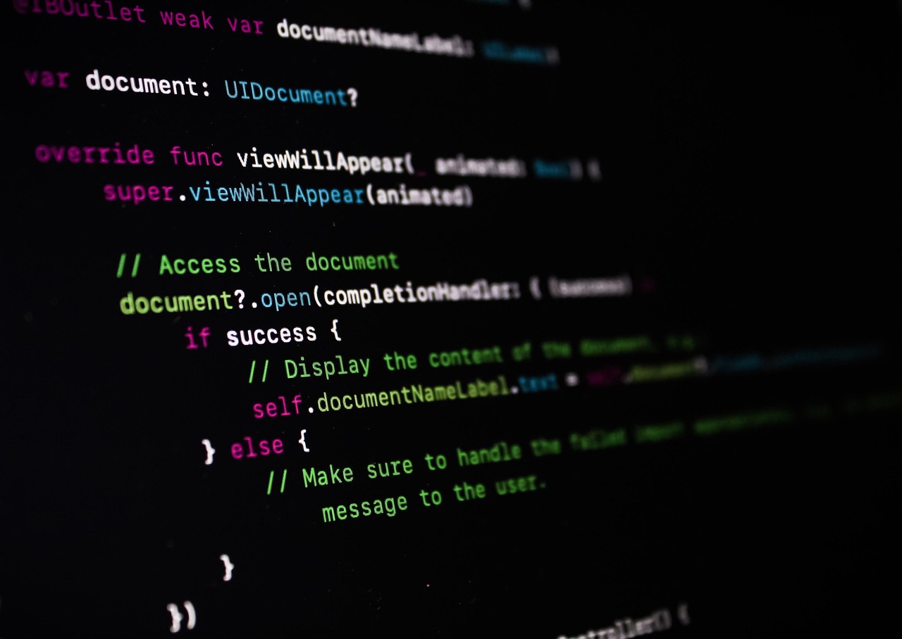 Swift source code on a dark screen where a closure block is passed as the completionHandler argument to a document open call